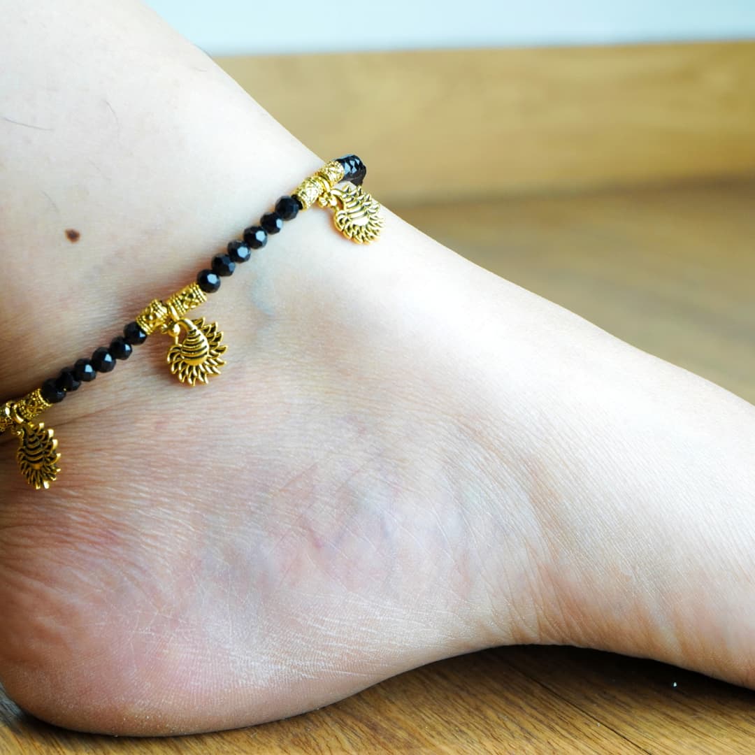 Golden peacock anklet